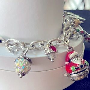 Brighton silver-tone bracelet. Multiple Christmas charms that are removable.